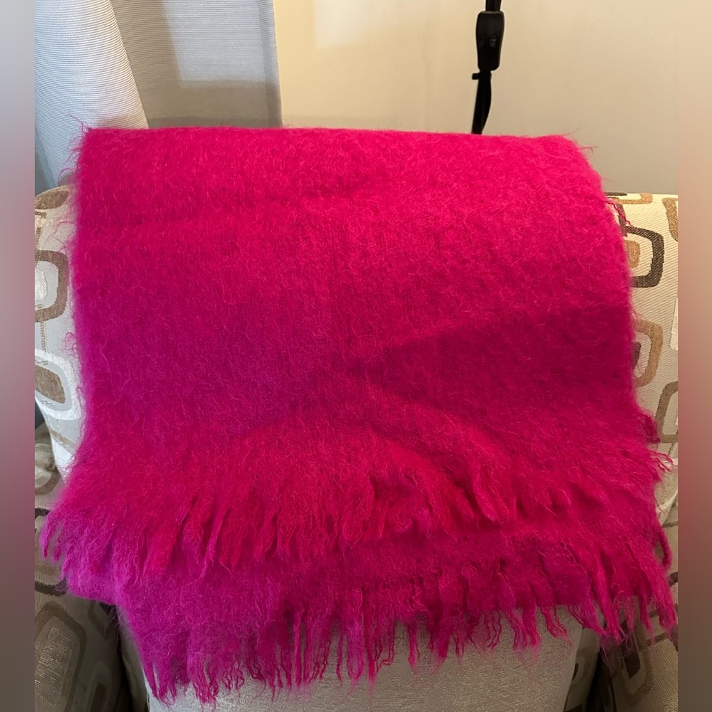 Wool wrap with fringe.